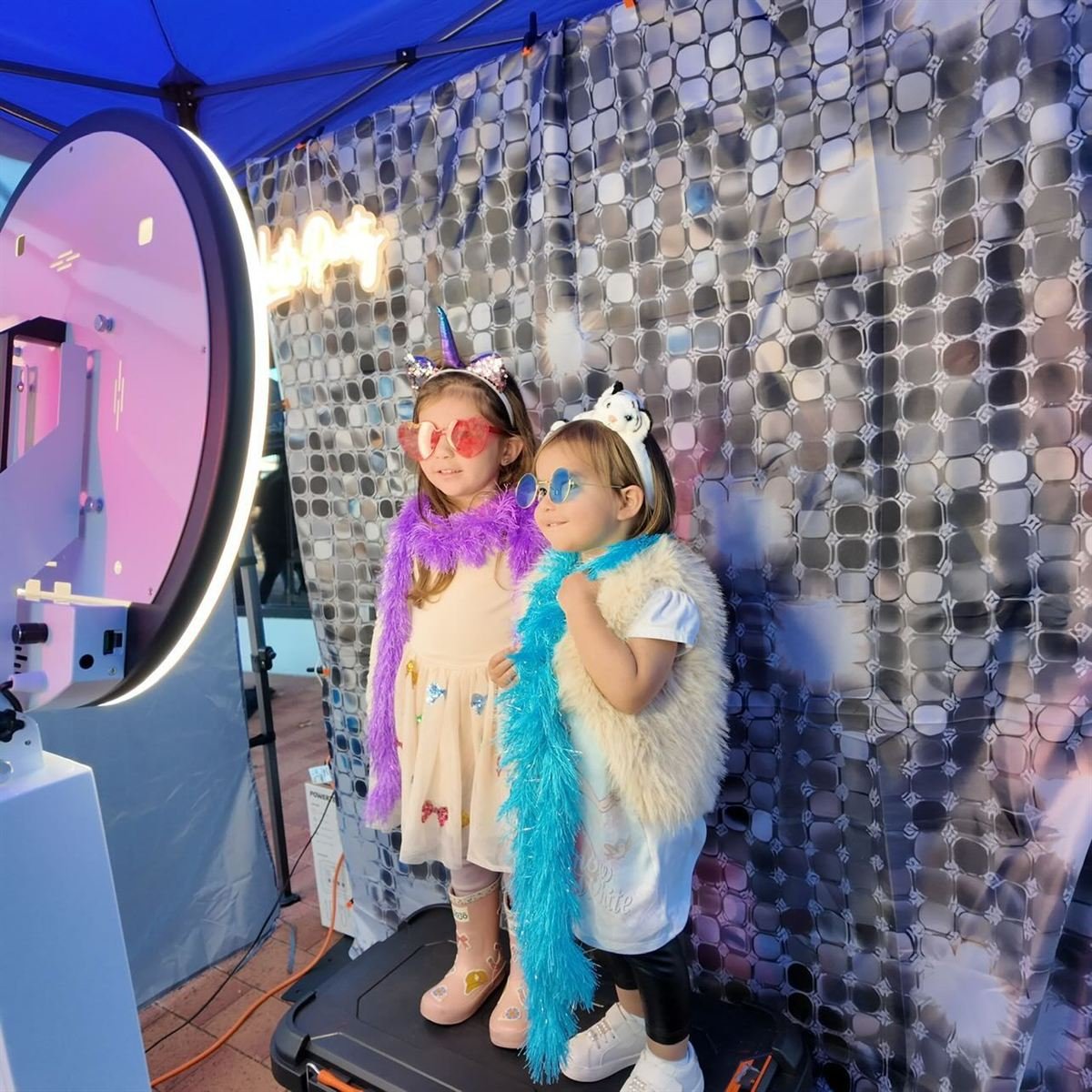 Guests with props at a Fotobooth Perth booth